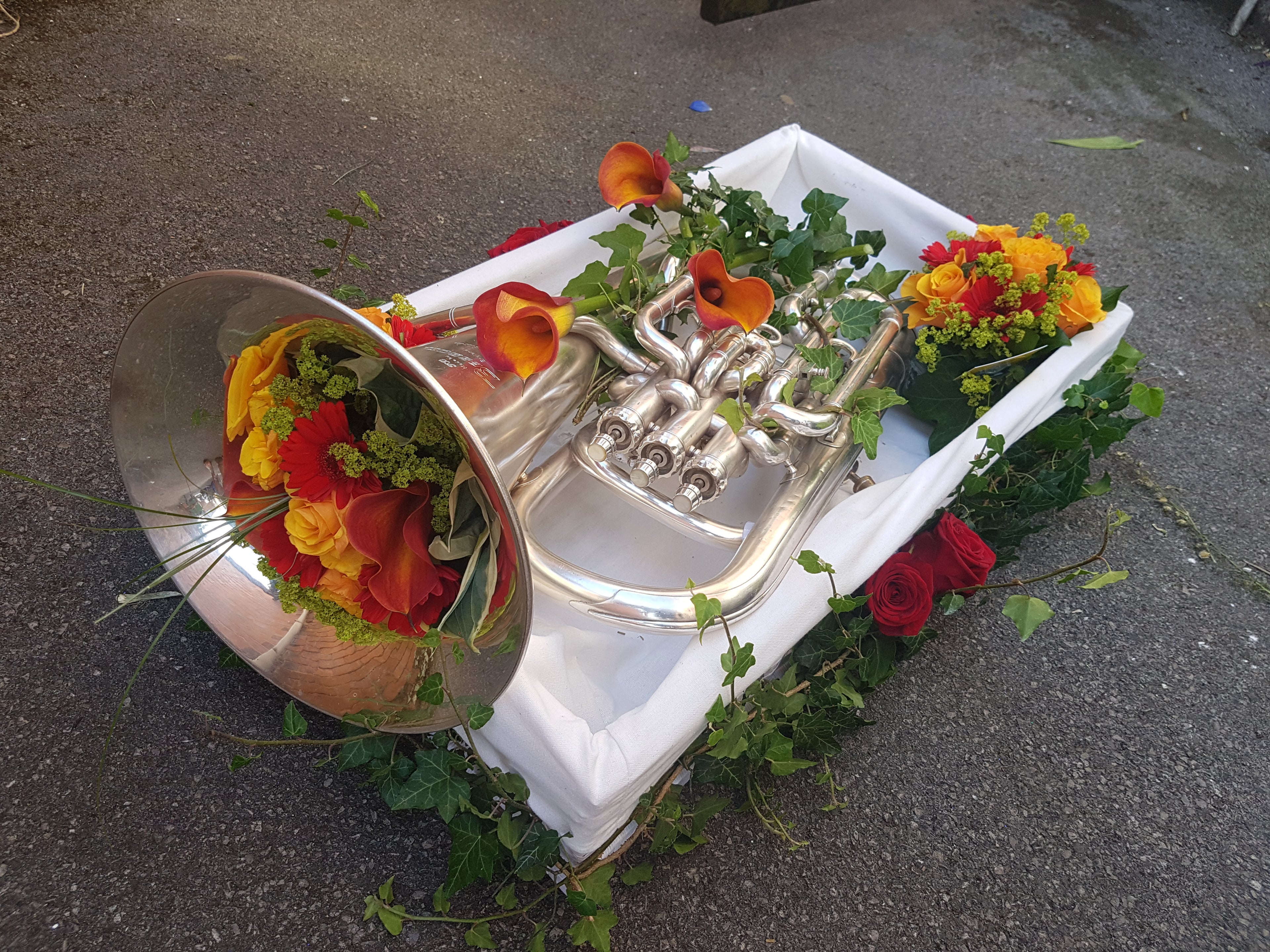 Bespoke Funeral Tribute of a floral decorated tenor horn