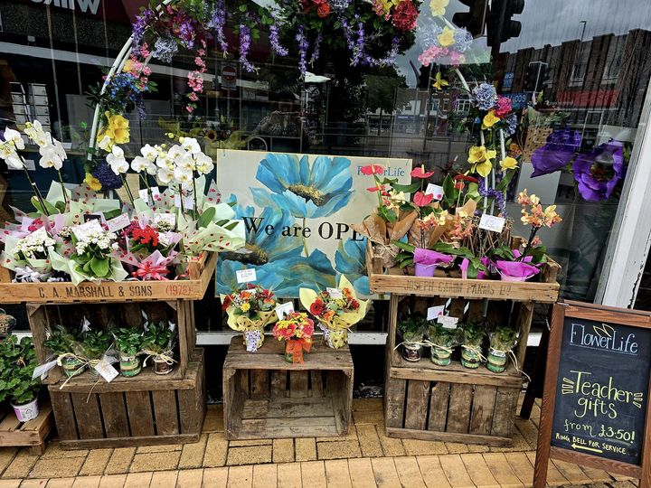Photograph of shop window featuring colourful teacher gifts